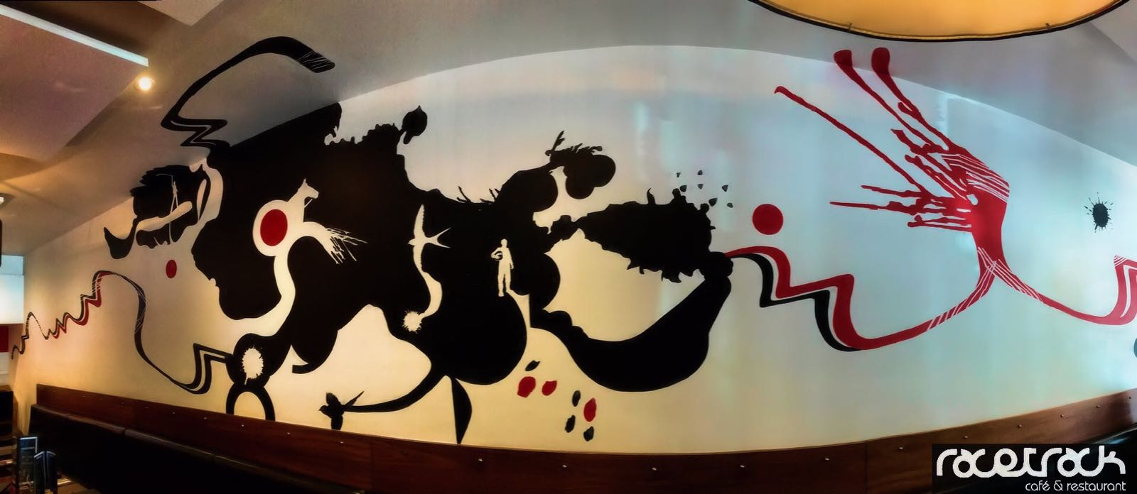 The distinctive mural inside Racetrack Café